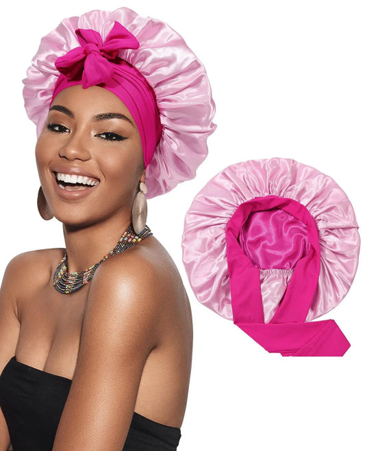 Woman wearing a pink satin sleep bonnet with tie and bow, displayed alongside product close-up.